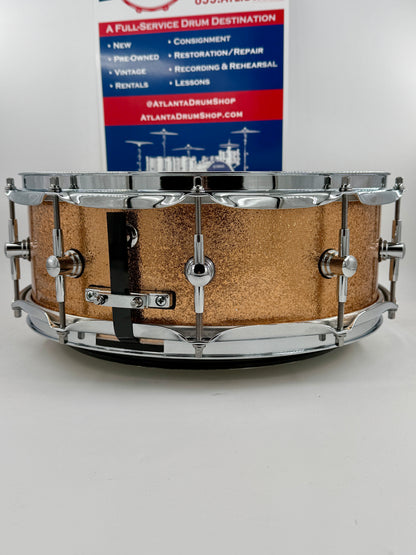 Montineri Custom Drums:   14” x 5” 10-COB Lug Copper Sparkle Snare