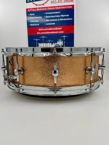 Montineri Custom Drums:   14” x 5” 10-COB Lug Copper Sparkle Snare