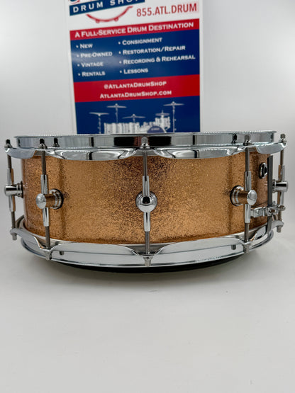 Montineri Custom Drums:   14” x 5” 10-COB Lug Copper Sparkle Snare